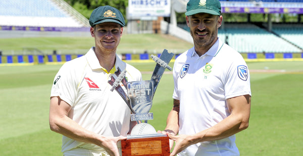 The two team captains meet on the pitch for the toss with the winner deciding which team